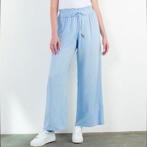 New w tags. THML flowy pants a drawstring.